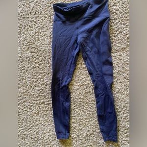 Dark purple/blue women’s Lululemon fleece running leggings. Size 6.